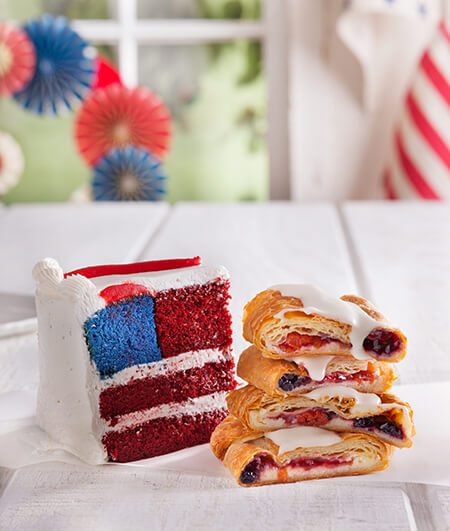 Slice of American flag cake and kringle
