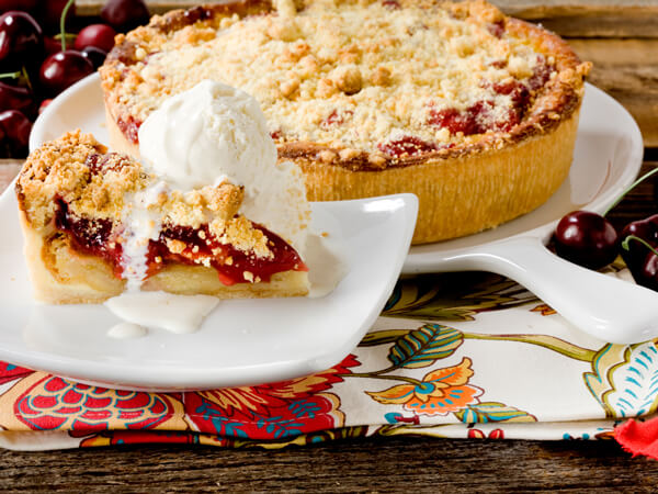 a slice of cherry bread pudding