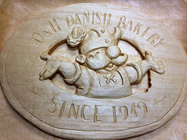 O&H Danish bakery wood carving