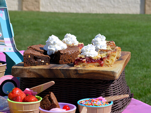 Gluten-Free Triple Chocolate Brownies and Cherry Bread Pudding topped with whipped cream