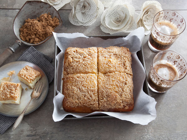 Danish Dream Cake served with two glasses of coffee