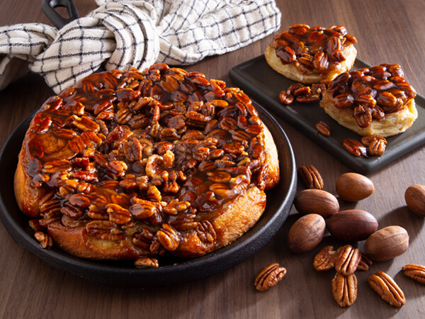 Danish Pecan Sticky Buns served on a cast iron skillet