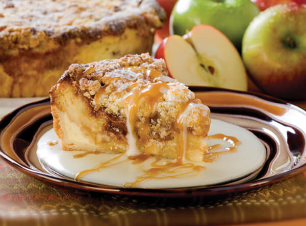 Danish Cinnamon Apple Bread Pudding served with cream