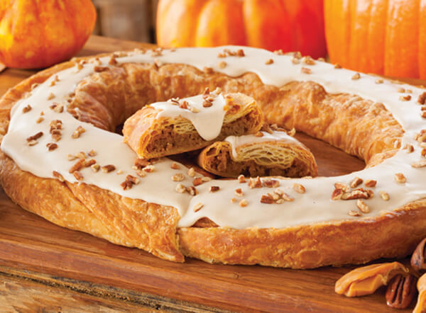 Pumpkin Caramel Kringle topped with chopped nuts