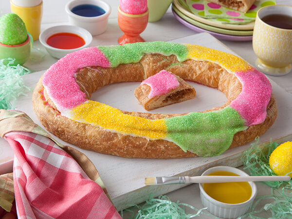 Easter Kringle with pink, yellow, and green sprinkles