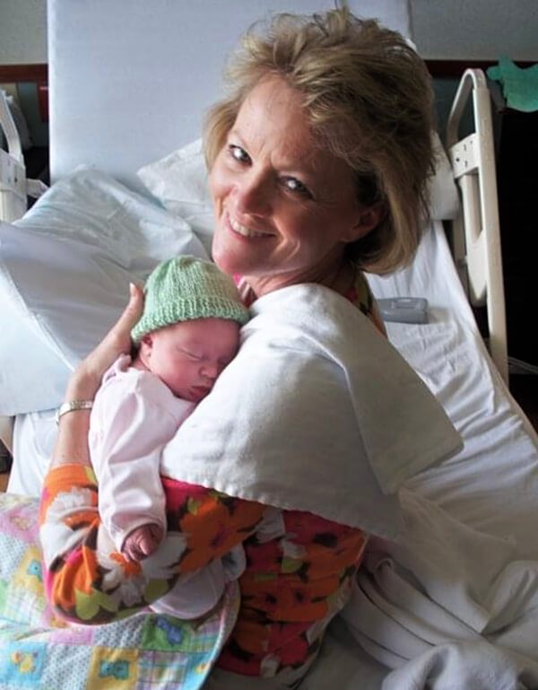 Robin Olesen with her newborn baby