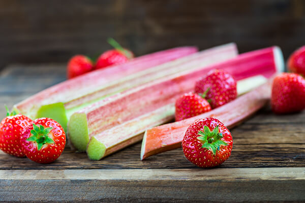 Strawberries and rhubarb stalks