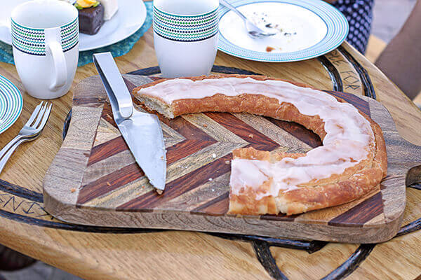 Kringle being served on a cutting board