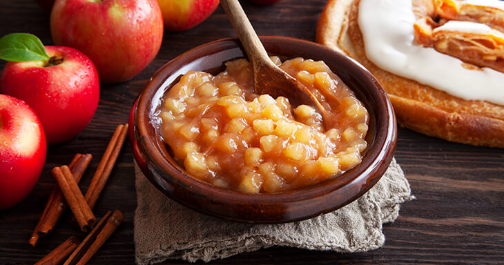 Scratch-made filling composed of crisp apple slices sprinkled with cinnamon for our Apple Kringle.